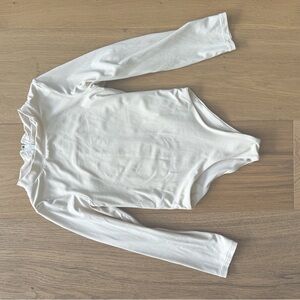 Toast Swim kids swim bodysuit. Light pink 5T